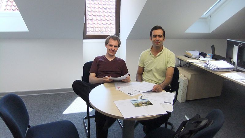 Researcher and Host sitting next to each other